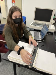 Graduate student Maureen Iplenski works on records at the Metro Wilmington Urban League